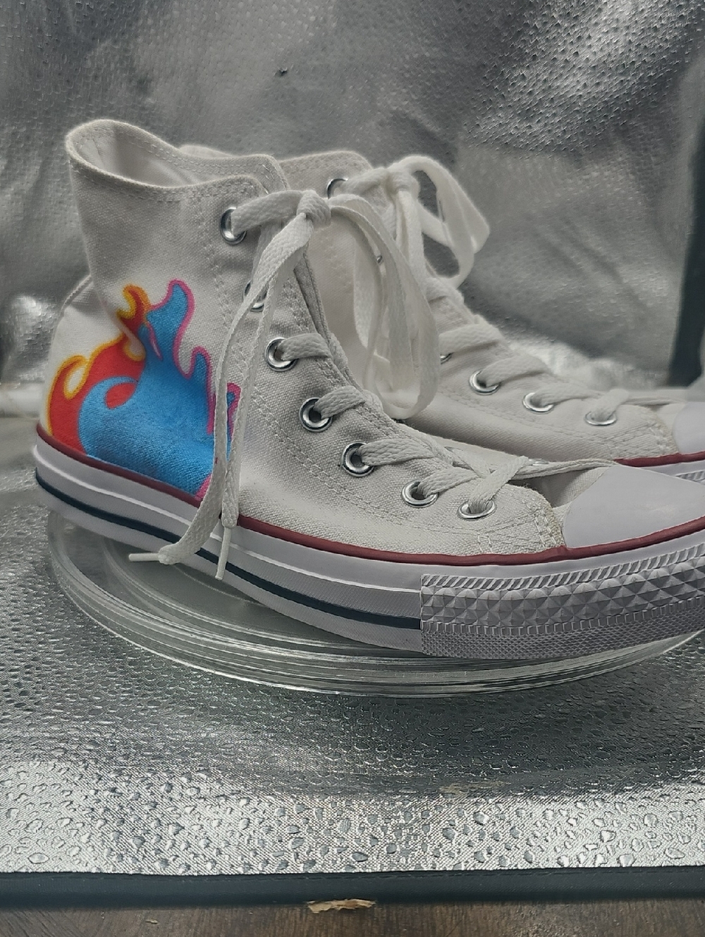 O White Converse With One Side Painted Flames.